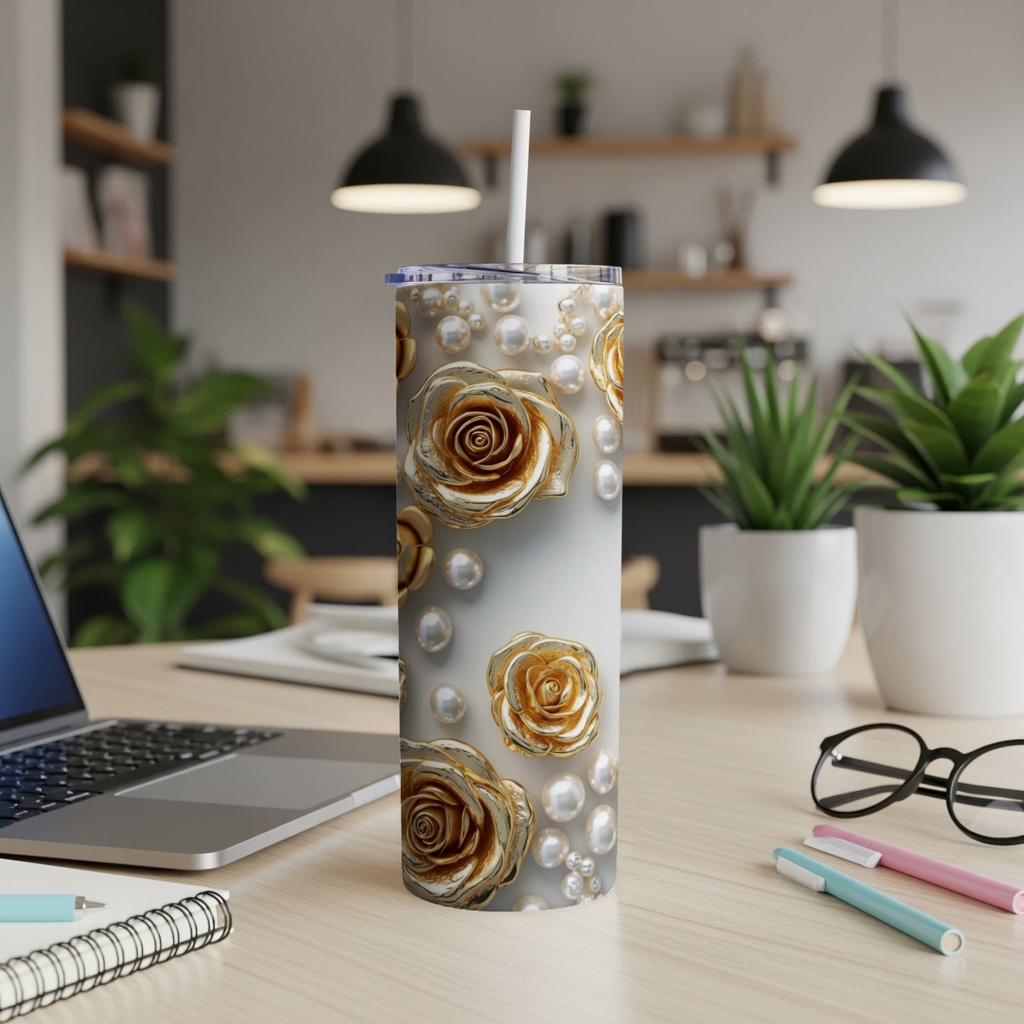 Gold roses and pearl pattern on a white tumbler with straw.