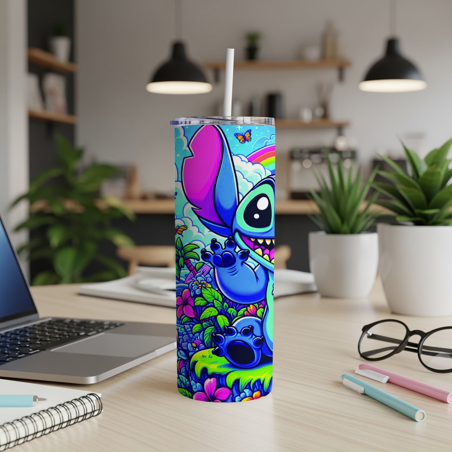 Blue Stitch character with rainbow and flowers on a skinny tumbler.