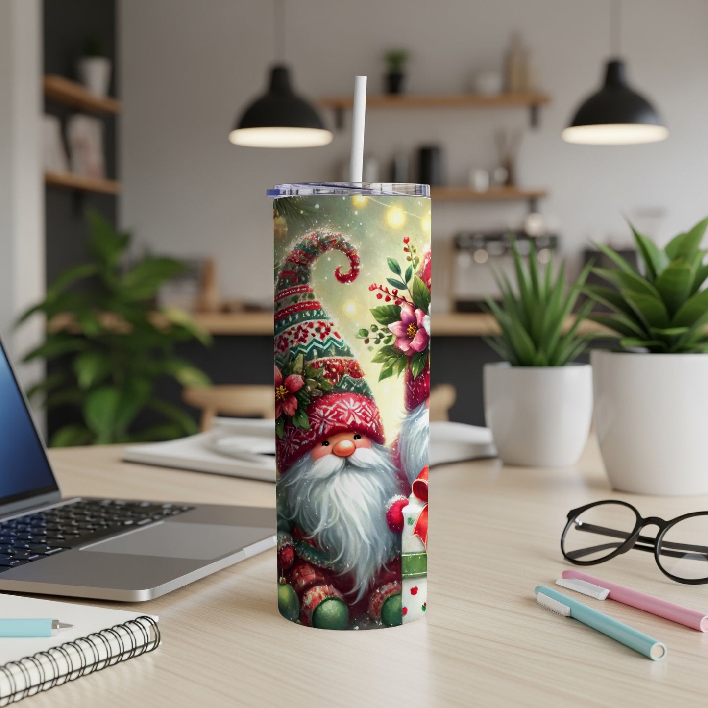 Christmas gnome with gift, festive lights, on a wooden desk.