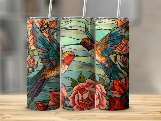 Three hummingbirds and roses in a stained glass design on tumblers.