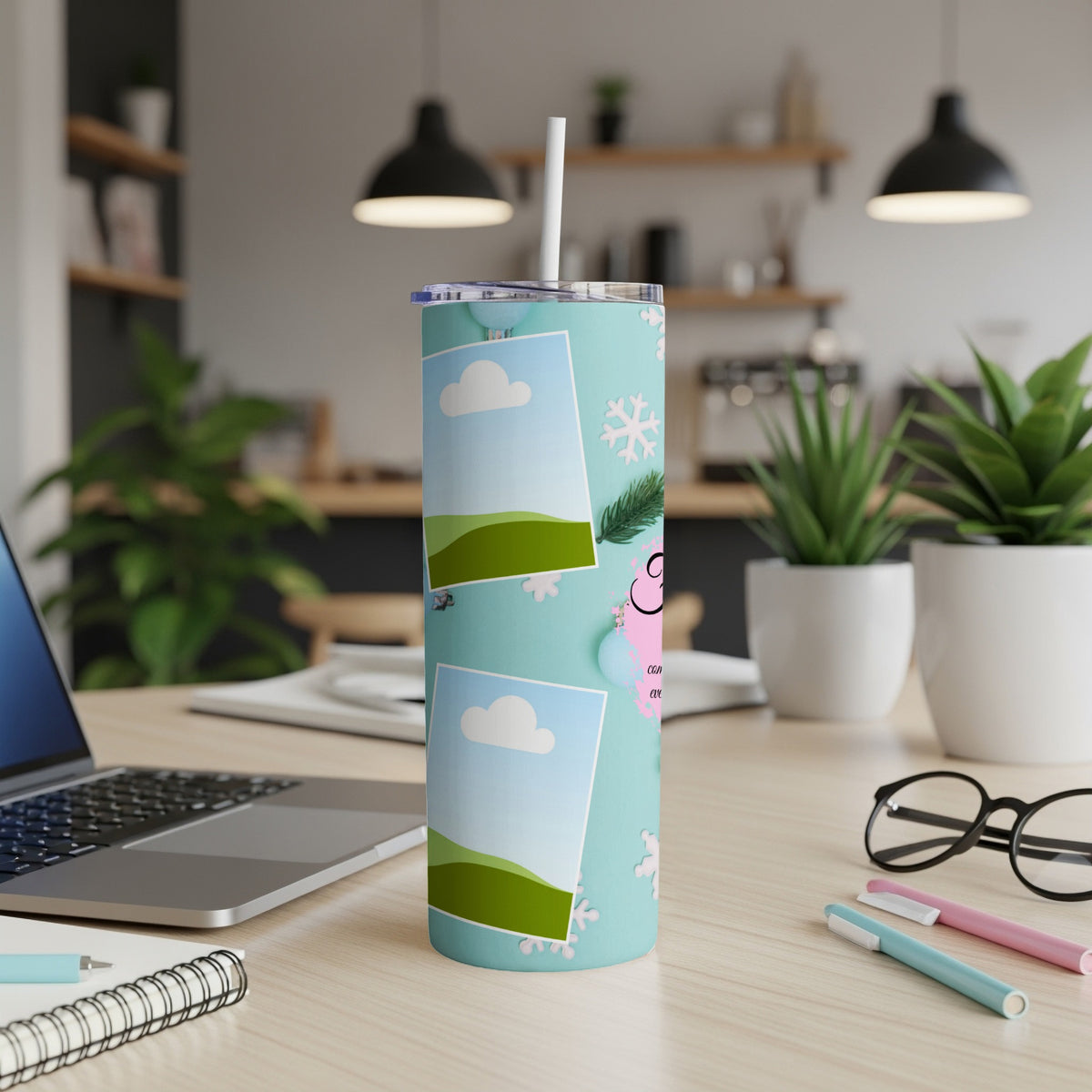 Aqua tumbler with pink pig illustration, photo frames, and snowflakes.