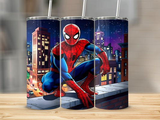 Spiderman crouches on a rooftop in a city at night.