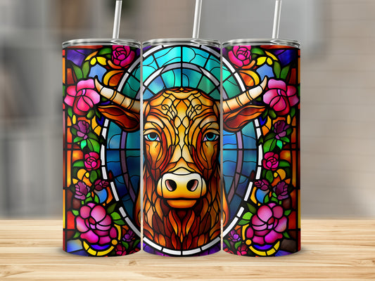 Stained glass bull with floral border on a tumbler.