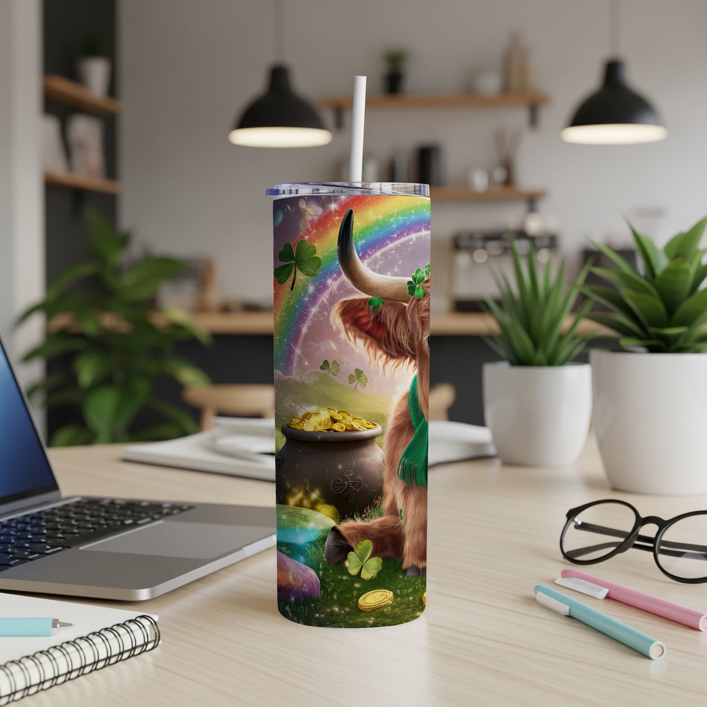 Highland cow with rainbow and pot of gold on a tumbler.