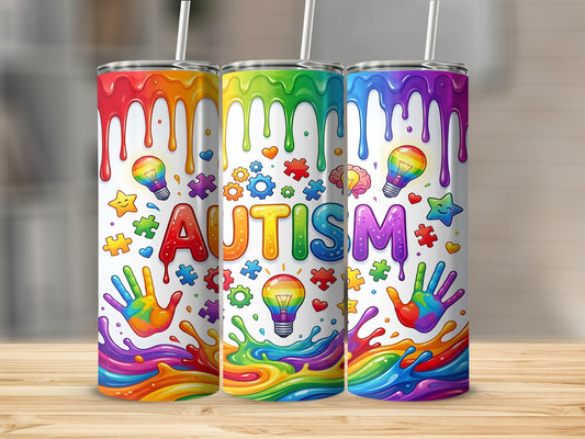 Three tumblers with colorful "AUTISM" text and autism awareness symbols.