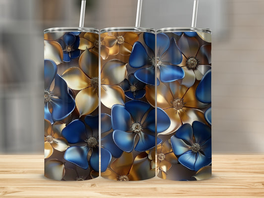 Three tumblers with blue and gold floral pattern, standing on a wooden surface.