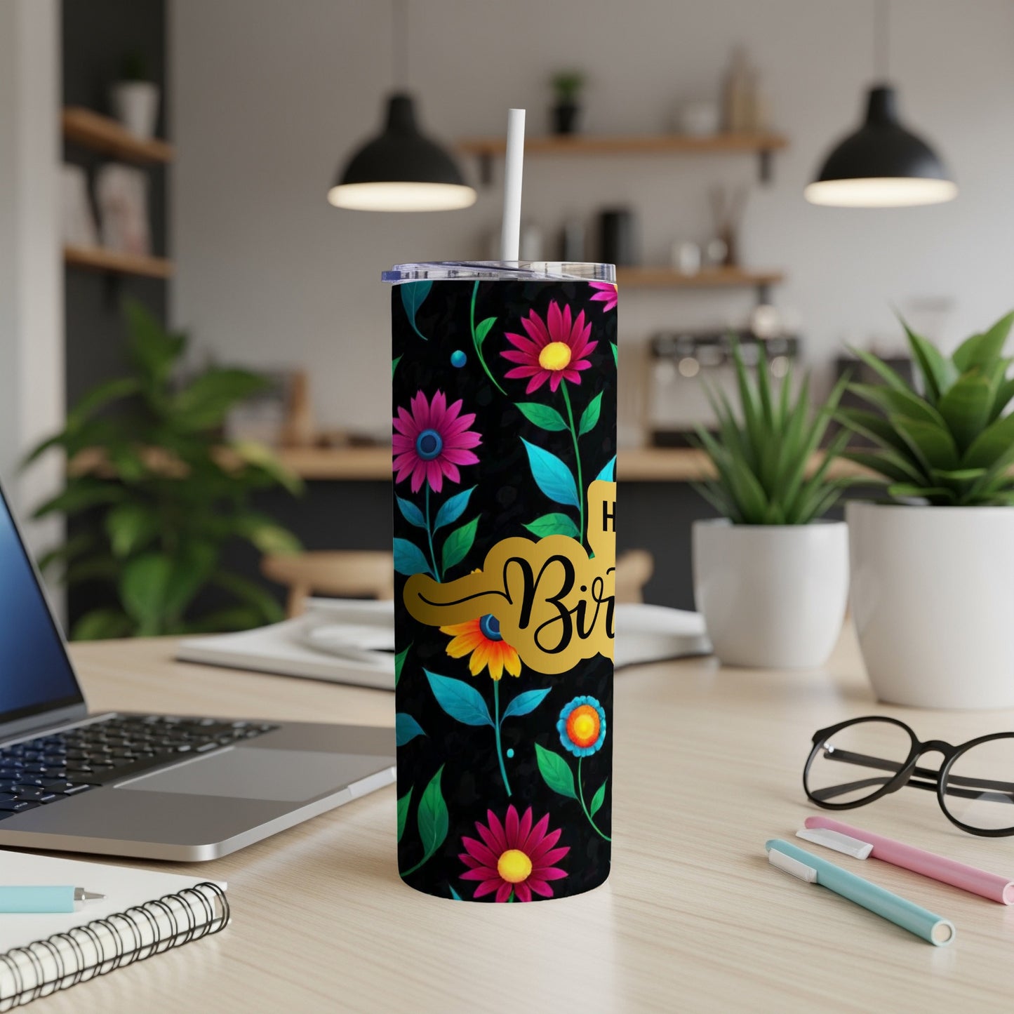 Happy Birthday tumbler with colorful floral and leaf design.