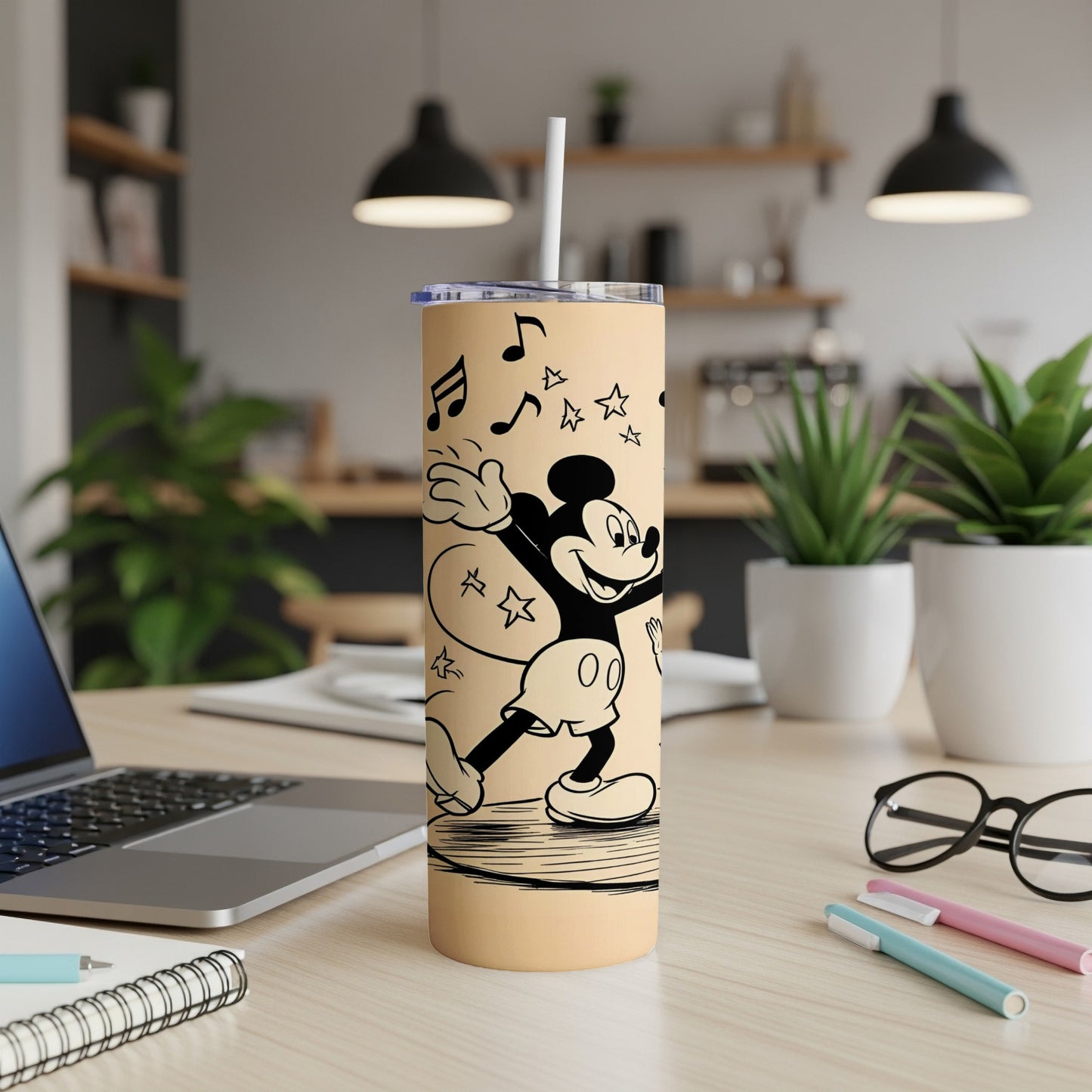 Mickey Mouse on a beige tumbler with stars and musical notes.