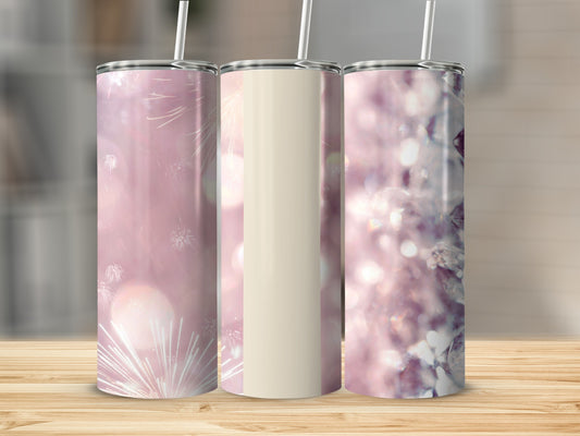 Three tall tumblers with pink, sparkling, and festive designs.