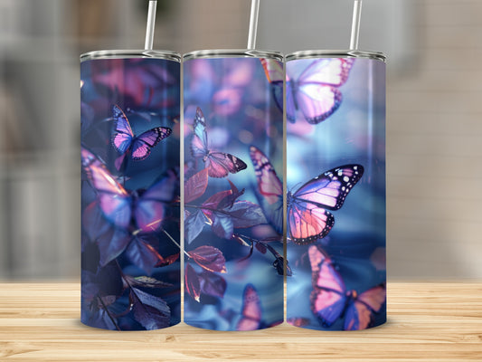 Three tumblers with purple and pink butterflies on floral background.