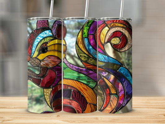 Stained glass squirrel tumbler with colorful, segmented body.