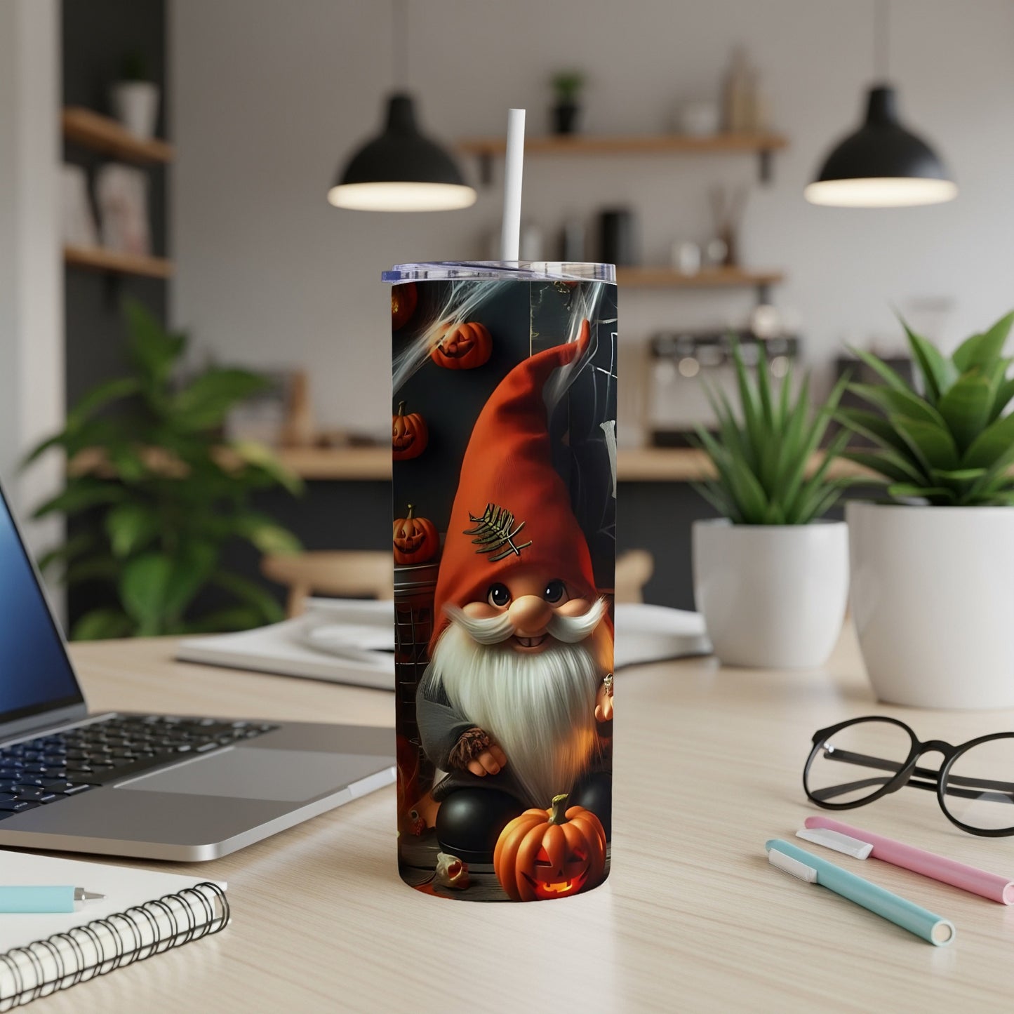 Halloween gnome tumbler with pumpkins and spiderwebs.