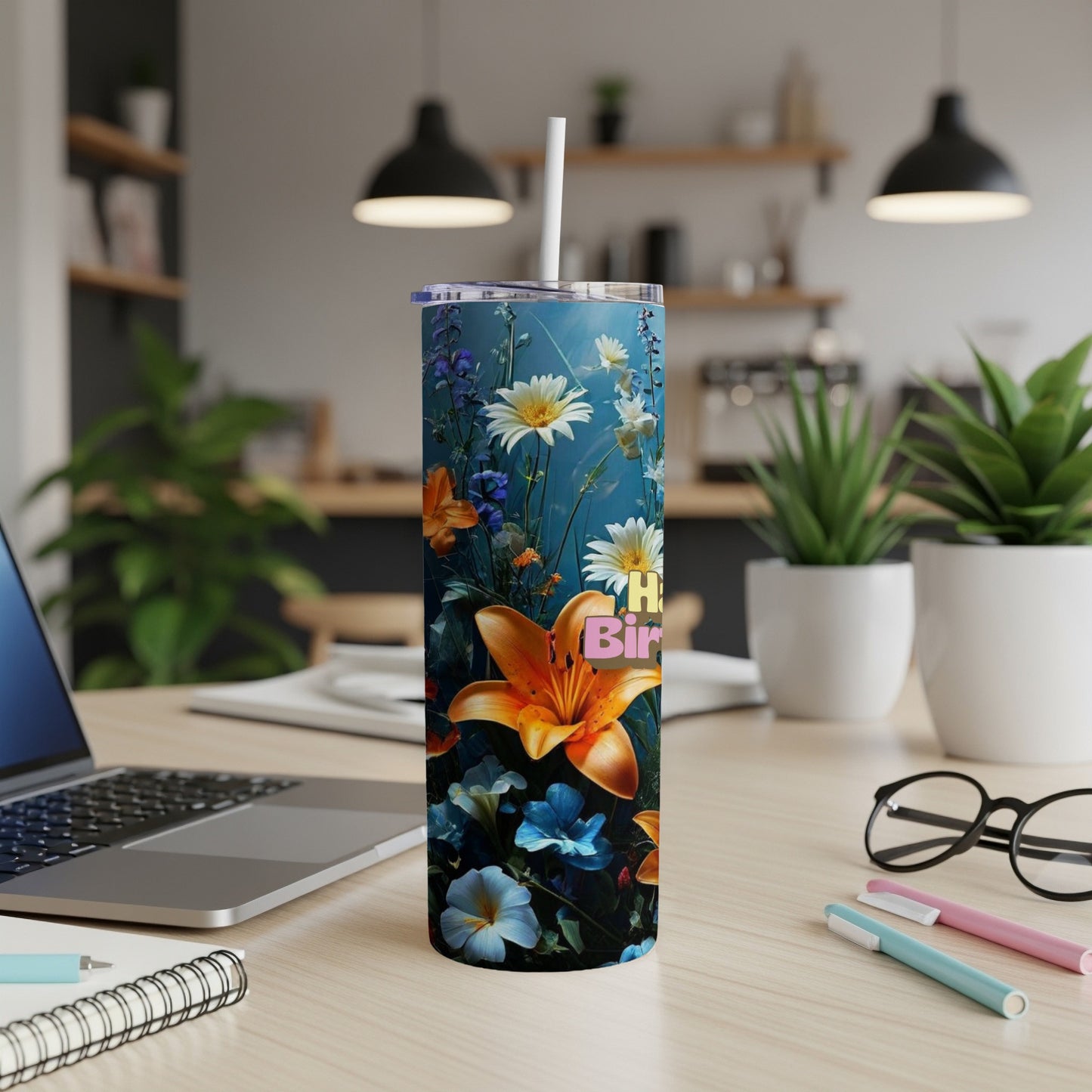 Tumbler with a vibrant floral design and "Happy Birthday" text.