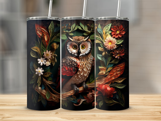 Owl perched on a branch with floral and foliage accents, presented on a tumbler.