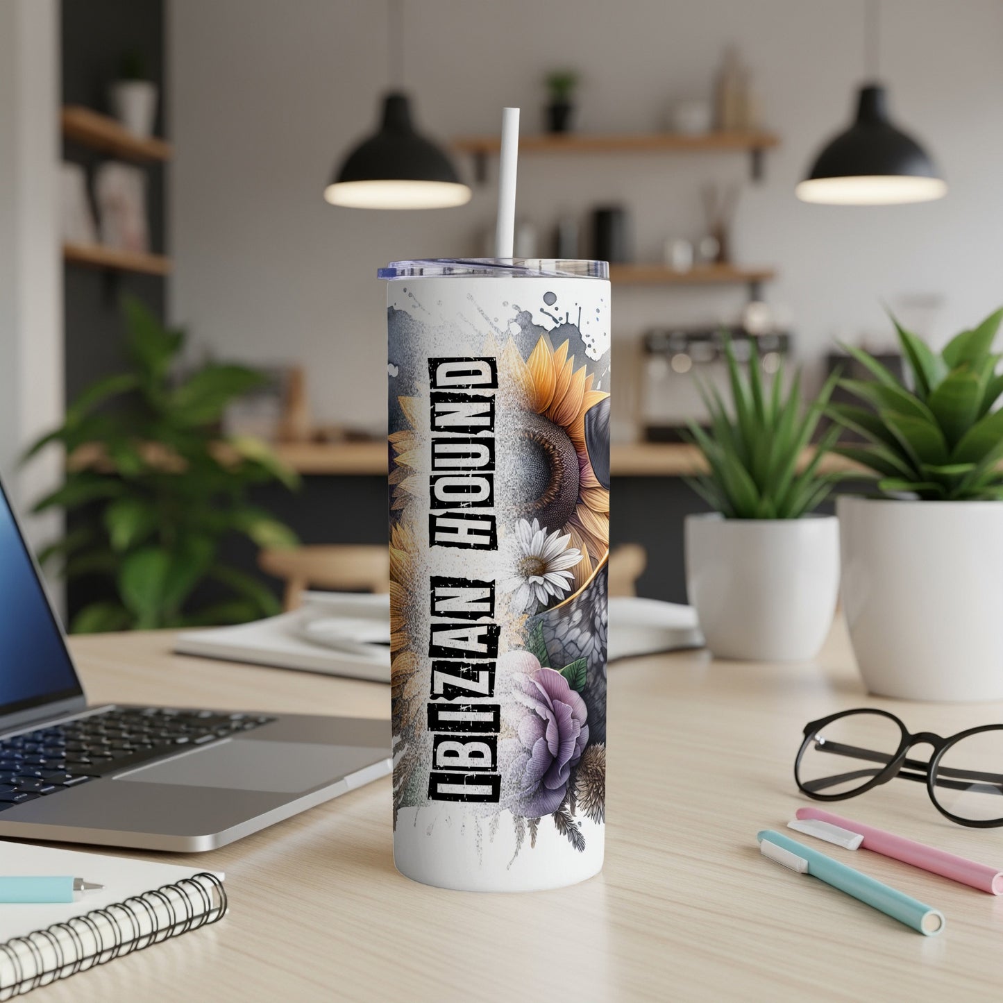 Ibizan Hound floral design on a white tumbler with a straw.