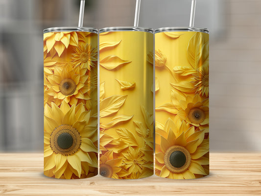 Three yellow tumblers with sunflower and leaf pattern on a wooden surface.