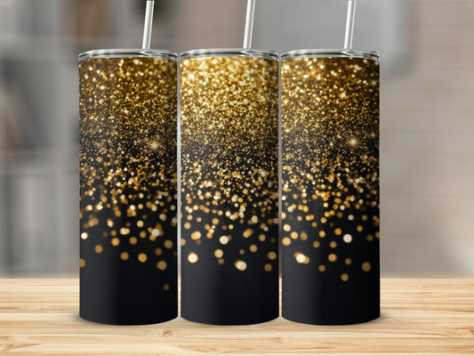 Three tumblers with gold glitter on a black background.
