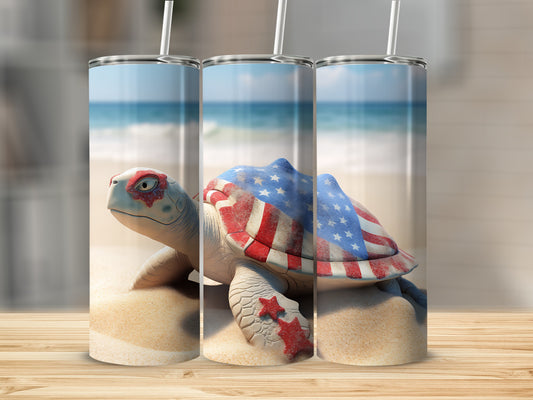 Turtle on sand with American flag design, close up.