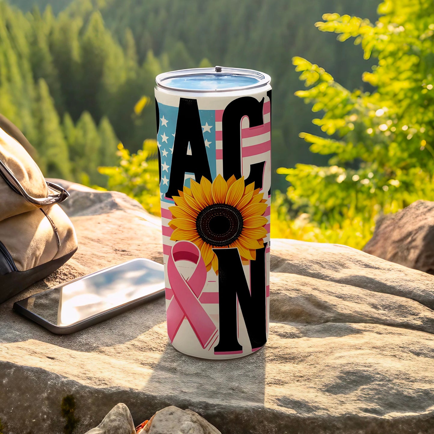 Tumbler with American flag pattern, sunflower, and pink ribbon design.