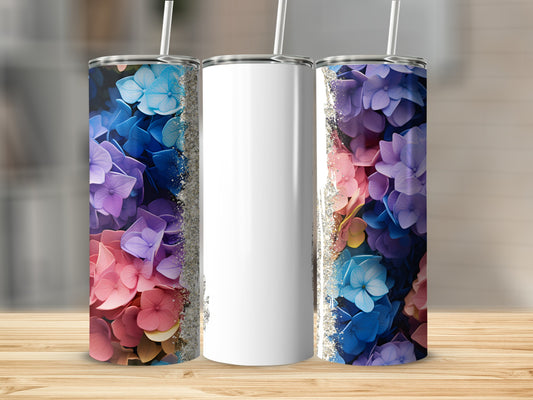 Tall white tumbler with hydrangea floral pattern and glitter accents.