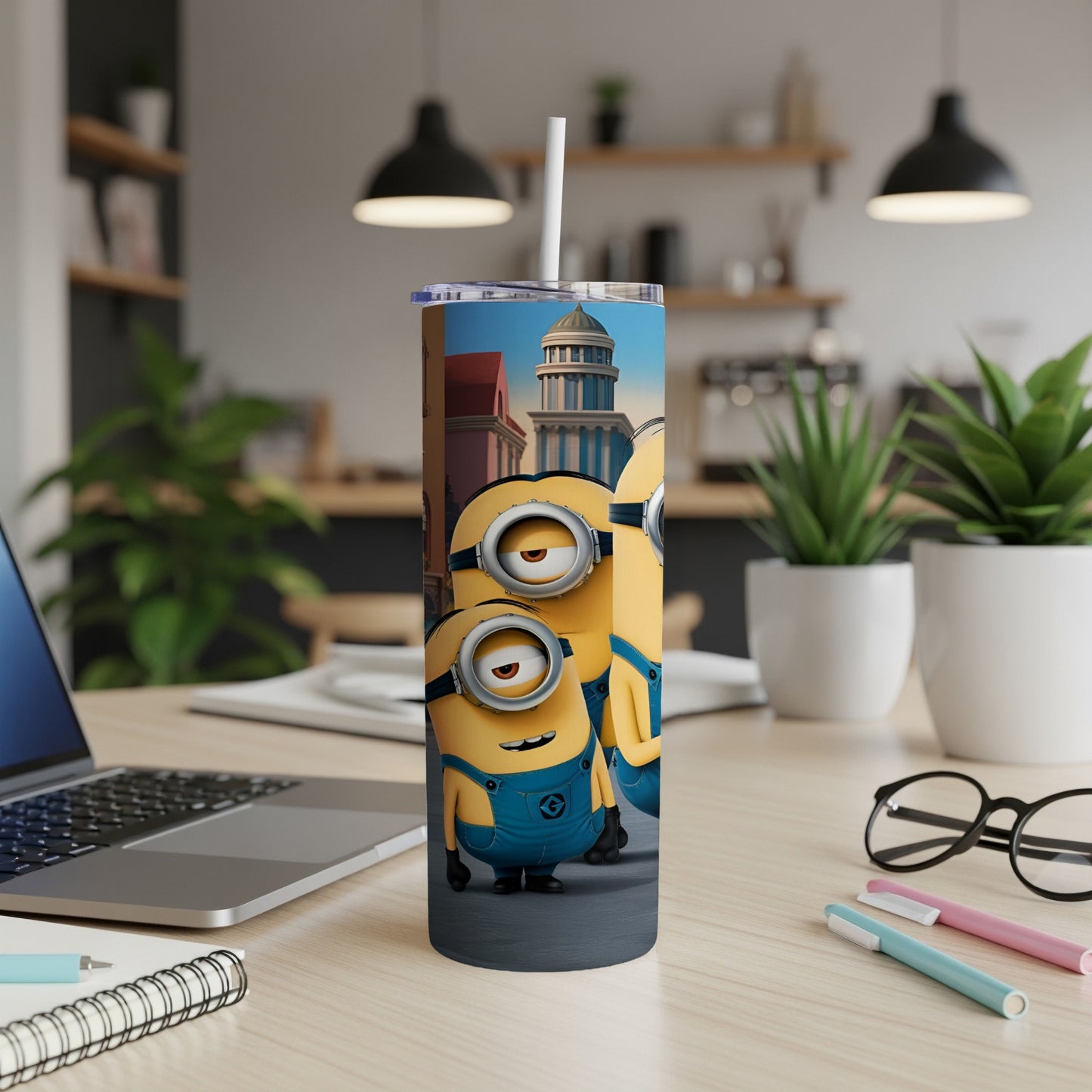 Three Minions on a tumbler with a kitchen counter in the background.