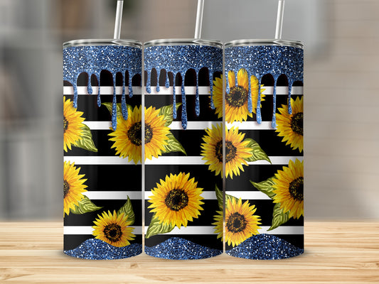 Three tall tumblers with sunflowers and blue glitter drip design on black and white stripes.