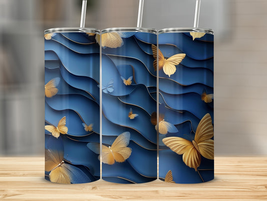 Three tumblers with a blue wavy background and gold butterflies.