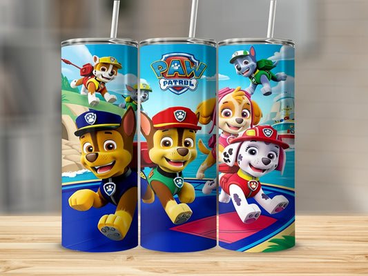 Paw Patrol pups Chase, Marshall, and Skye on a blue and yellow tumbler.