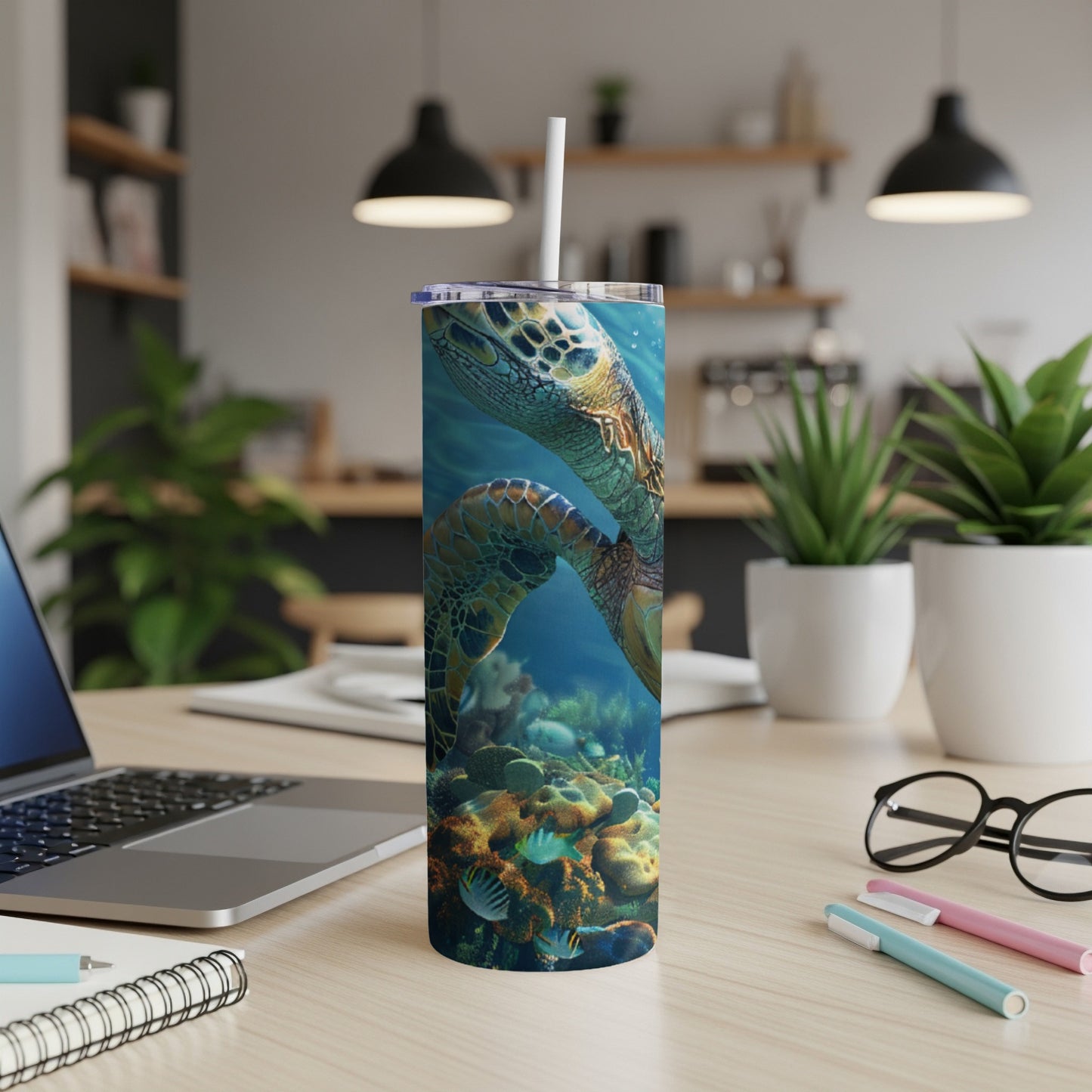 Sea turtle swimming underwater with coral and fish on a skinny tumbler.