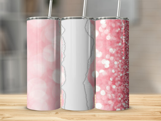 Three pink glitter tumblers with white ripped paper design and straws.