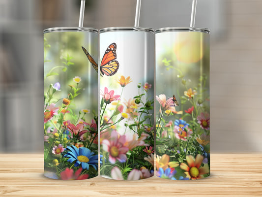 Floral garden scene with butterflies on three tumblers.