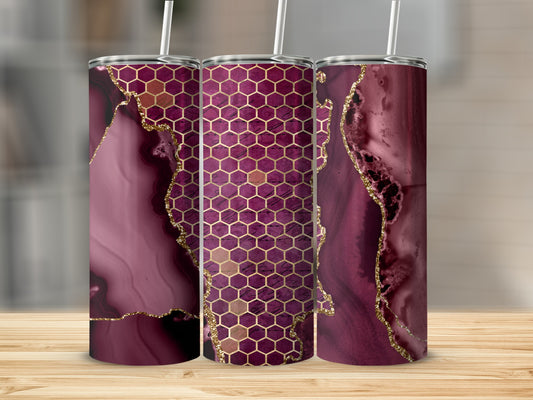 Three tumblers with burgundy marble and gold honeycomb patterns.