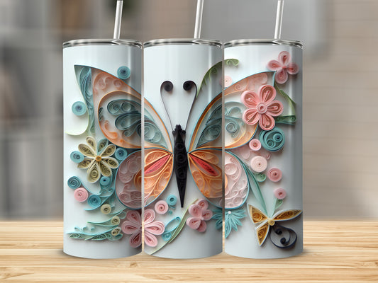 Three tumblers with a quilled butterfly and floral design.