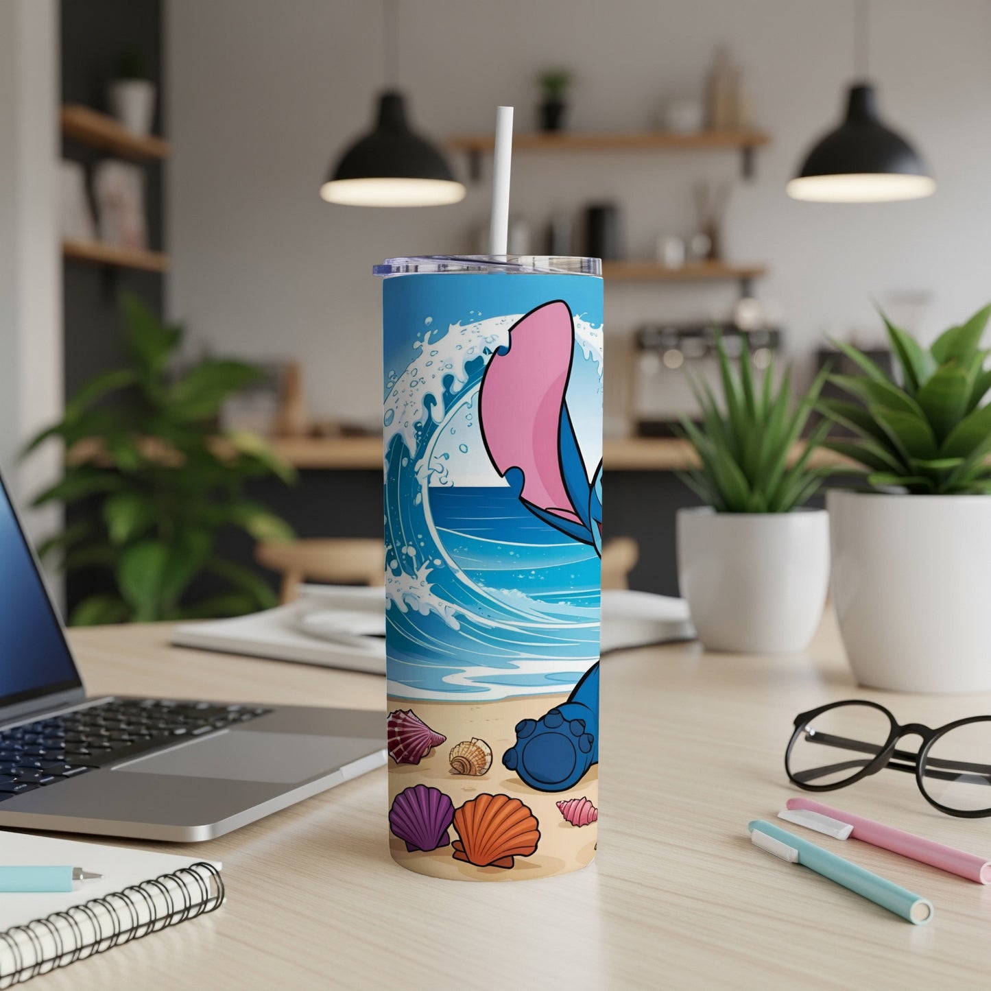Stitch character on a beach scene tumbler with seashells and waves.