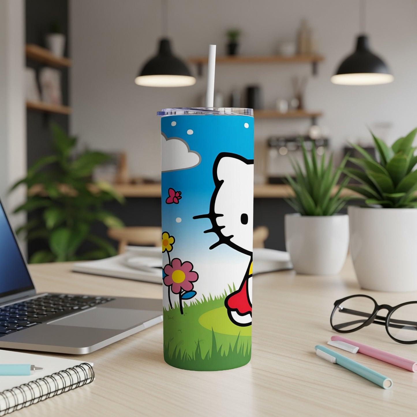 Hello Kitty tumbler with sky, clouds, flowers, and grass.