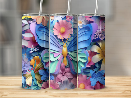 Butterfly and floral design on three tall tumblers with straws.