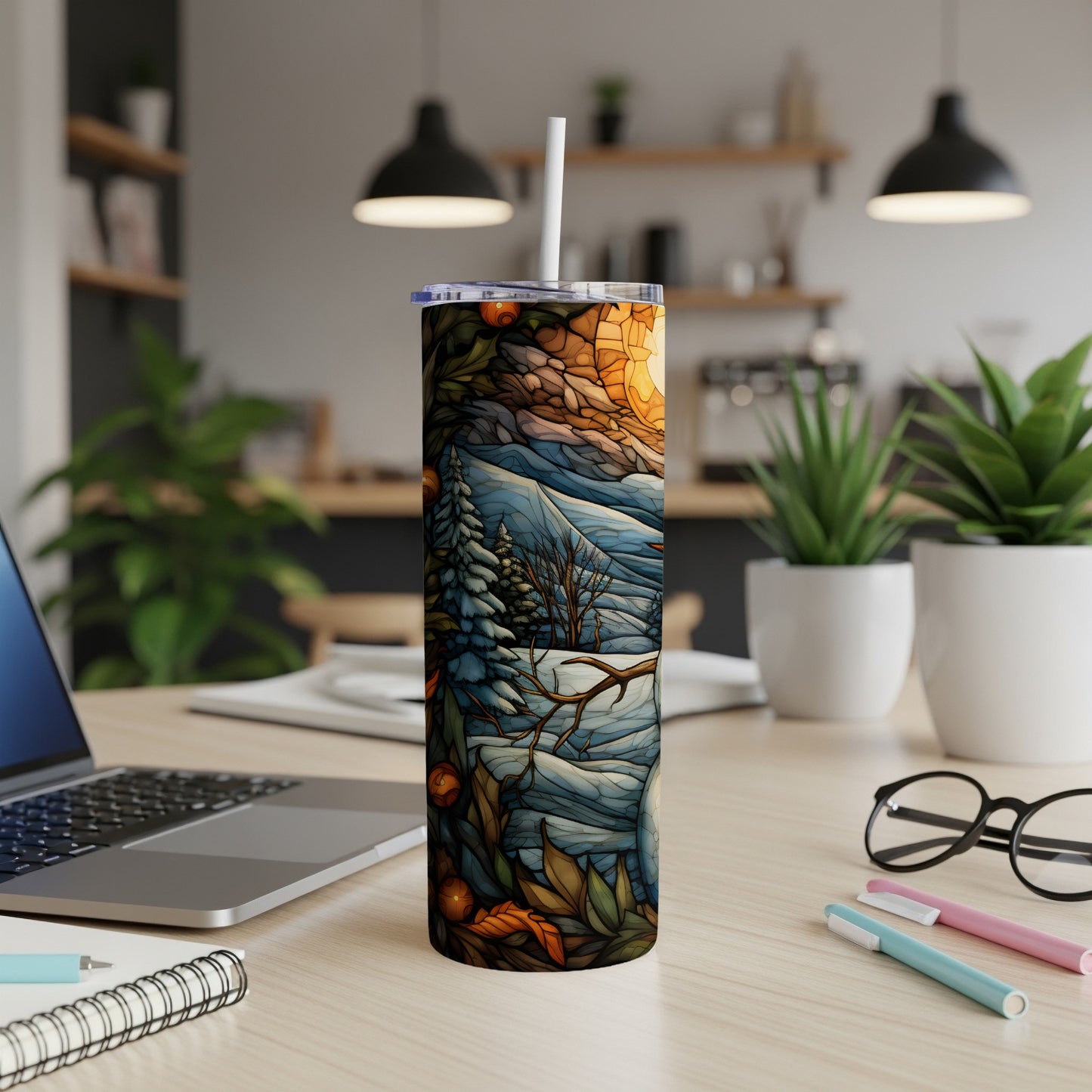 Winter forest scene on a white insulated tumbler with a straw.