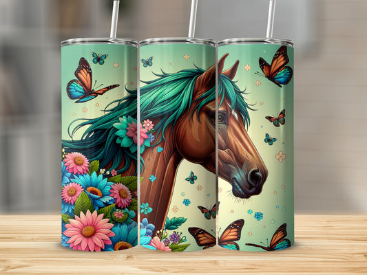 Horse with flowers and butterflies on a teal tumbler.