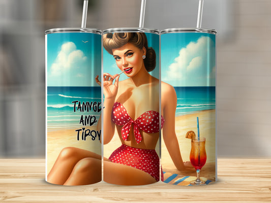 Woman in polka dot bikini on beach with "TANNING AND TIPSY" text.