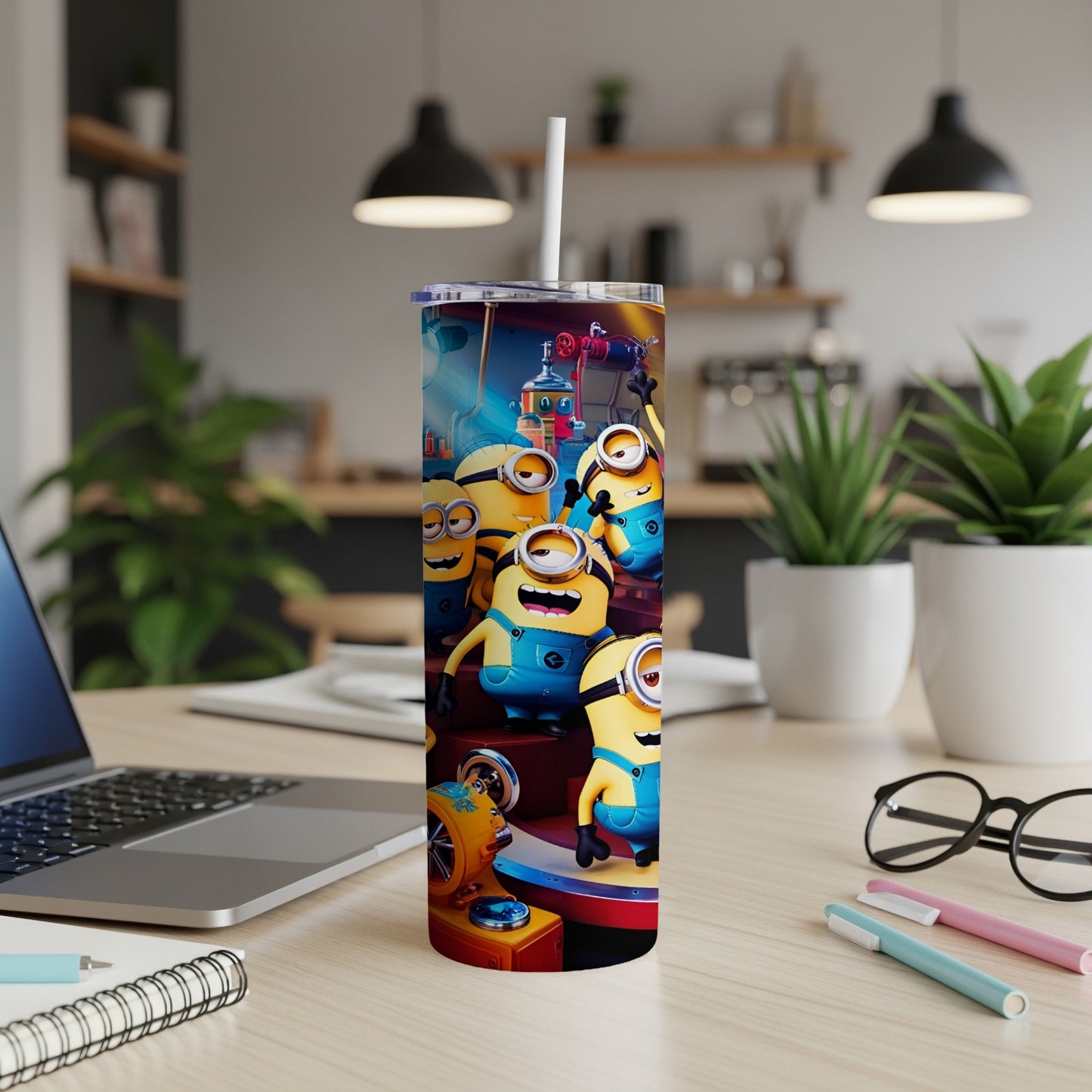 Minions characters on a colorful stand with a straw, on a desk.