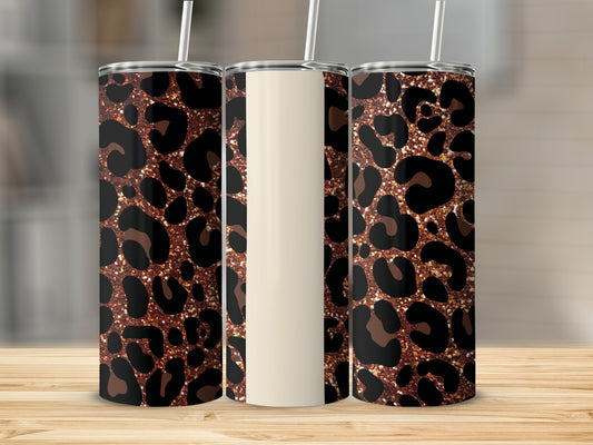 Three tumblers with leopard print and gold glitter designs.