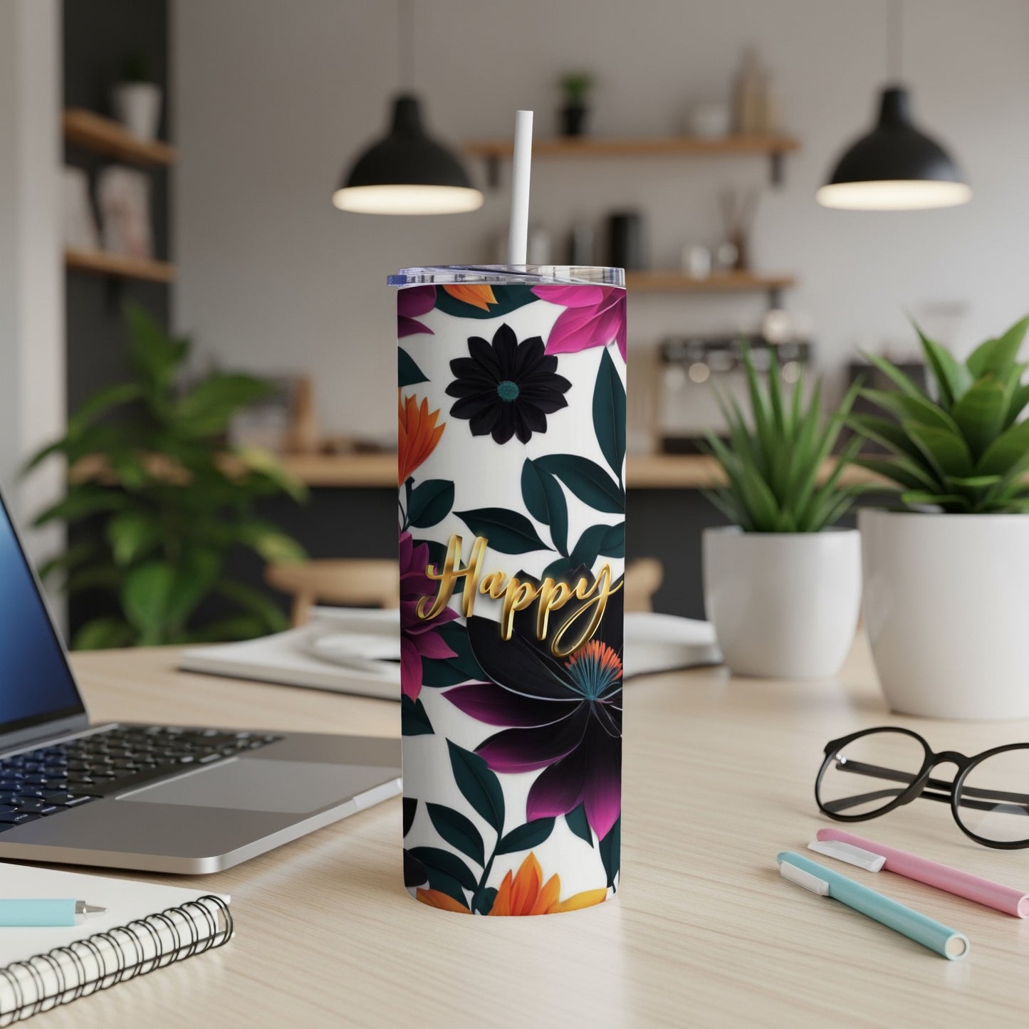 Tumbler with colorful floral pattern and "Happy" text.