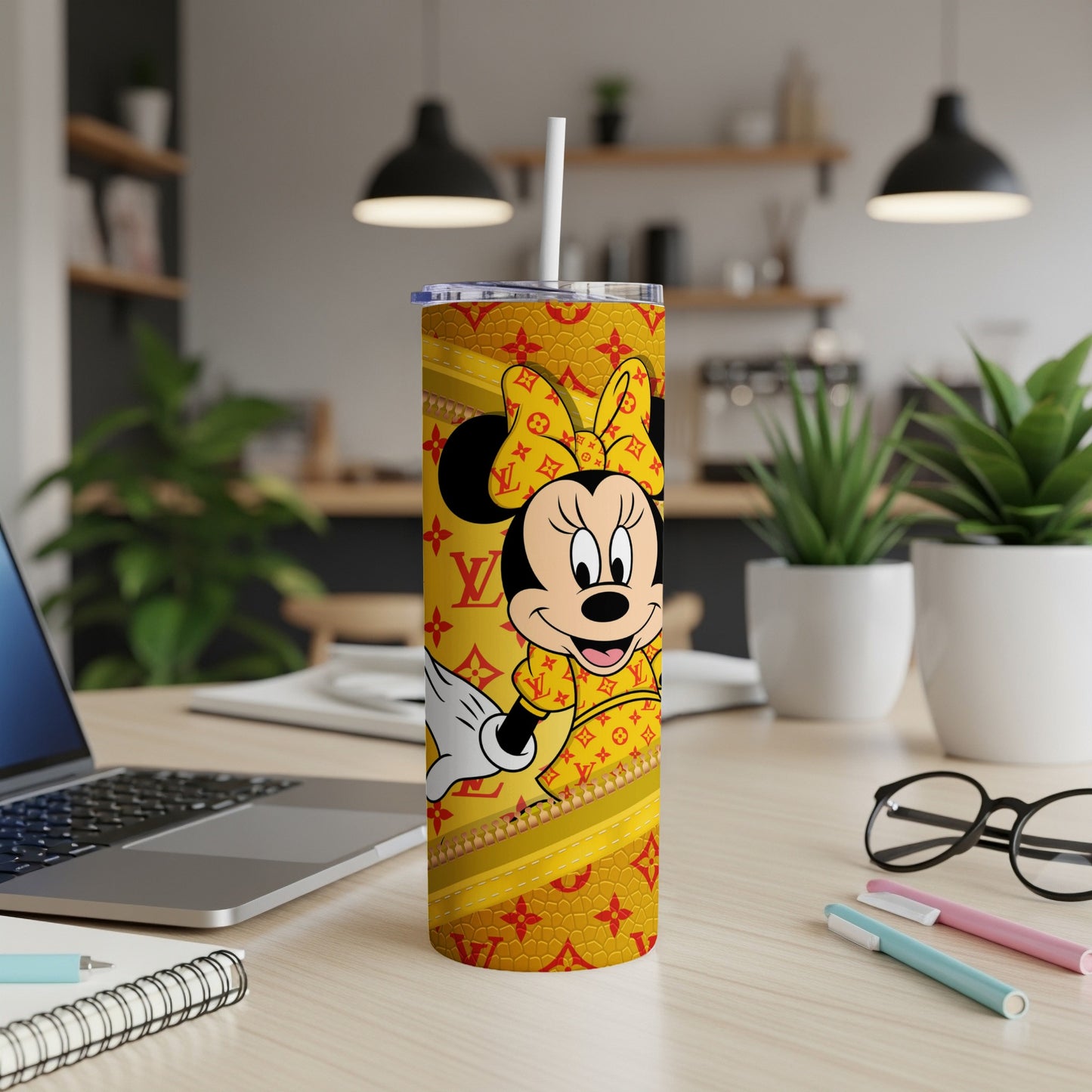 Minnie Mouse on a yellow tumbler with Louis Vuitton pattern.