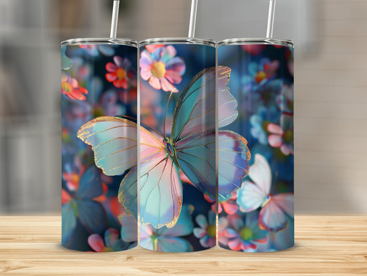 Three tumblers with a blue butterfly and floral design.