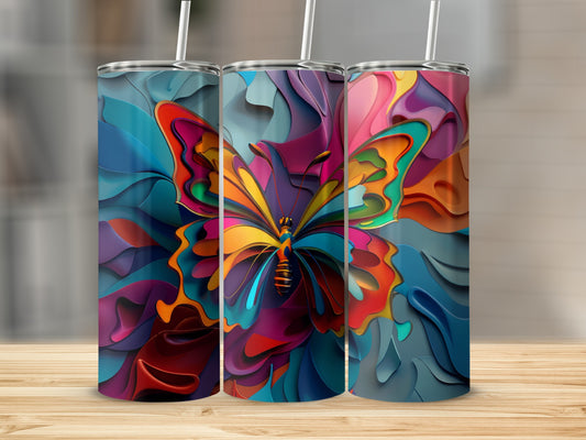 Abstract butterfly artwork on three tall, thin tumblers.