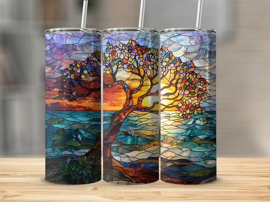 Three tumblers with stained glass tree and sunset over water design.
