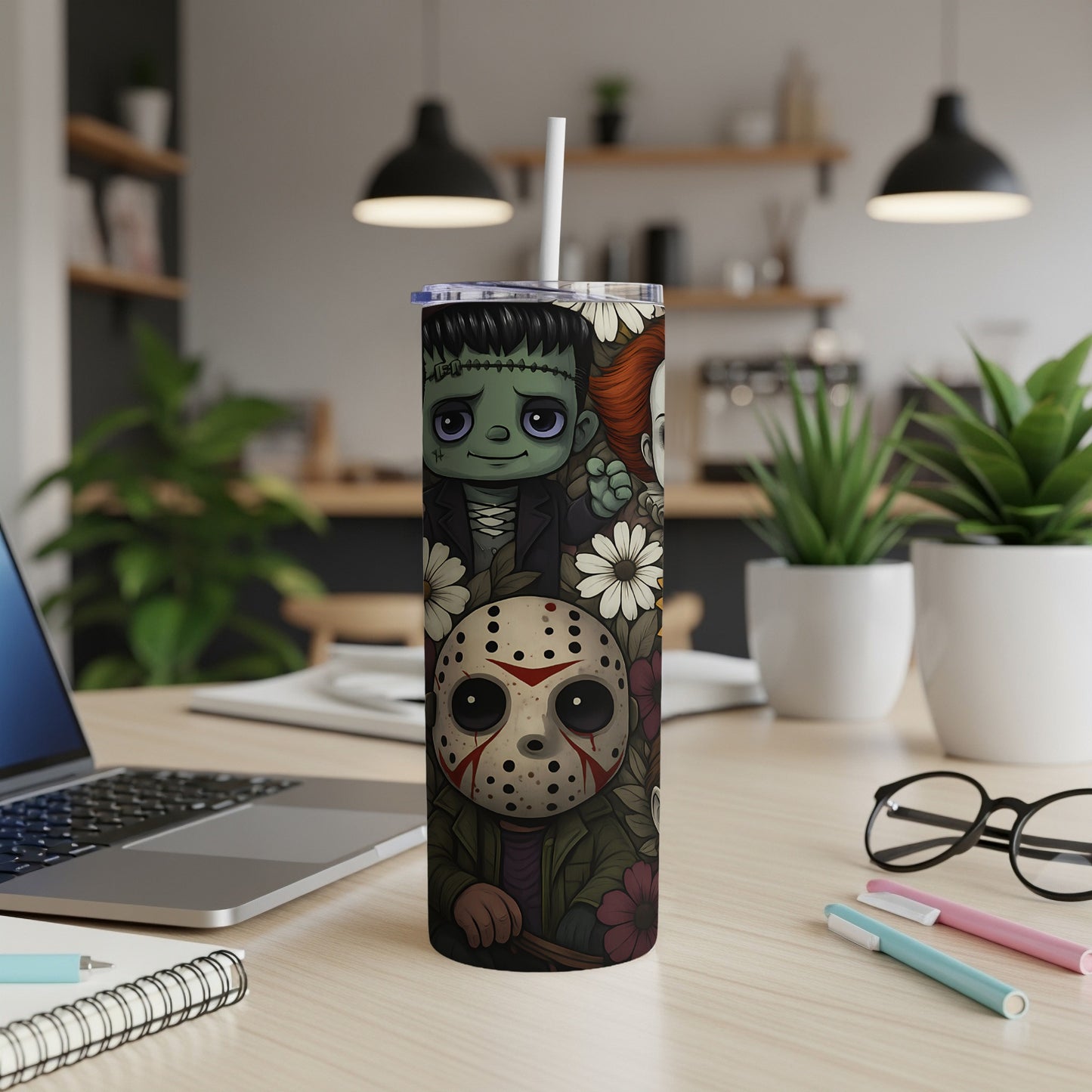 Tumbler with Frankenstein, Pennywise, and Jason Voorhees character art.