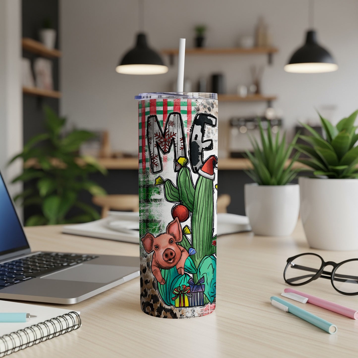 Christmas tumbler with pig, cactus, presents, and plaid background.