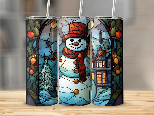 Snowman in stained glass with a winter village scene.