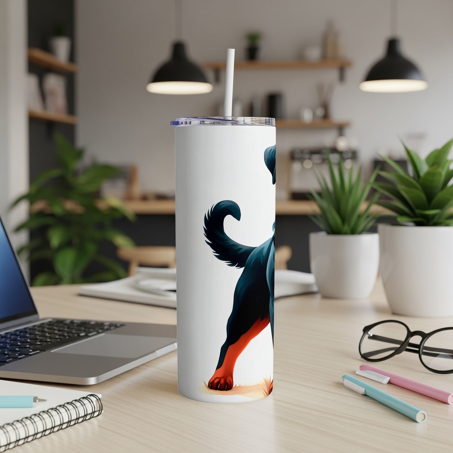 Rottweiler dog artwork on a white tumbler with straw.